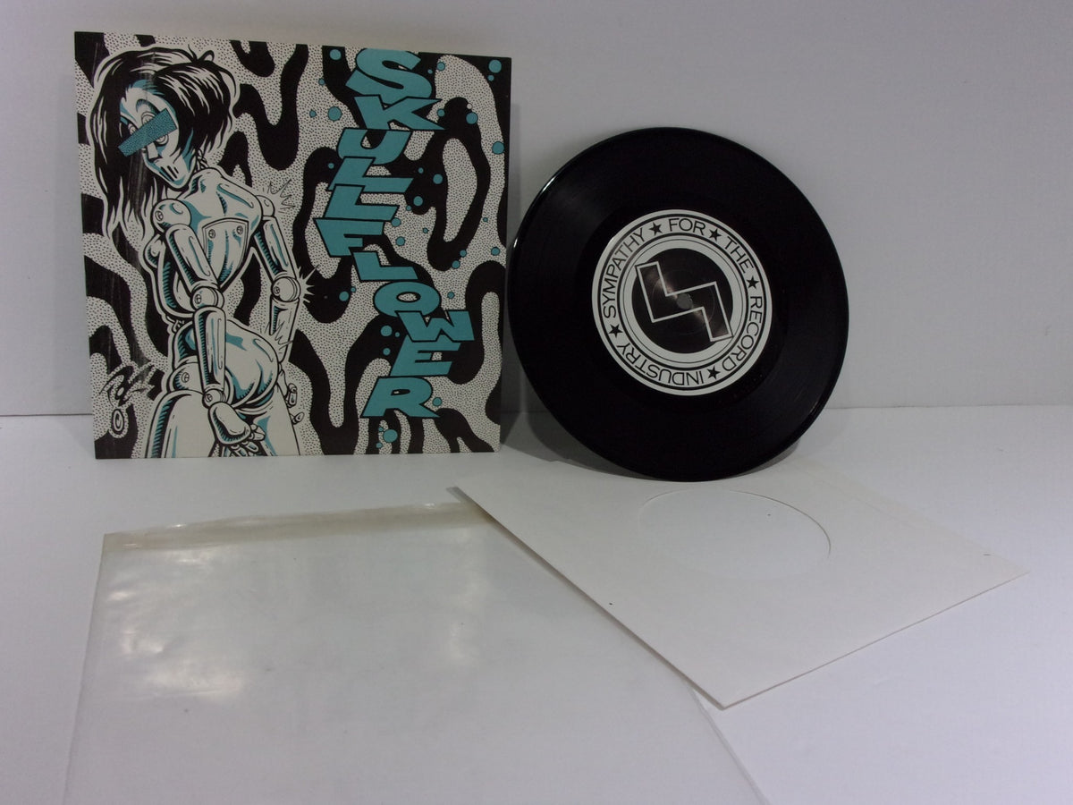 Skullflower: Evel Knievel SFTRI 202 7" Single with vibrant cover art featuring a stylized illustration, showcasing the album's unique design.