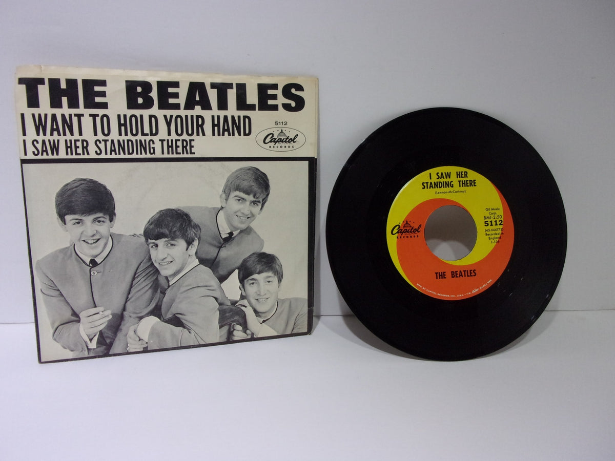 The Beatles: I Want To Hold Your Hand Capitol Records 5112 45RPM Single 7" featuring the iconic band on the cover.