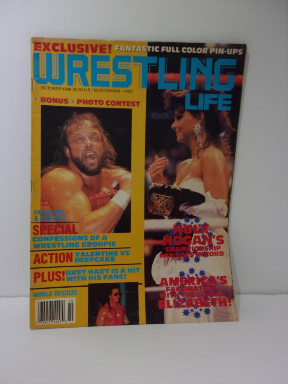 Cover of Wrestling Life Magazine: October 1988 featuring Randy Savage and Elizabeth, highlighting wrestling culture of the late 80s with vibrant colors and photos.