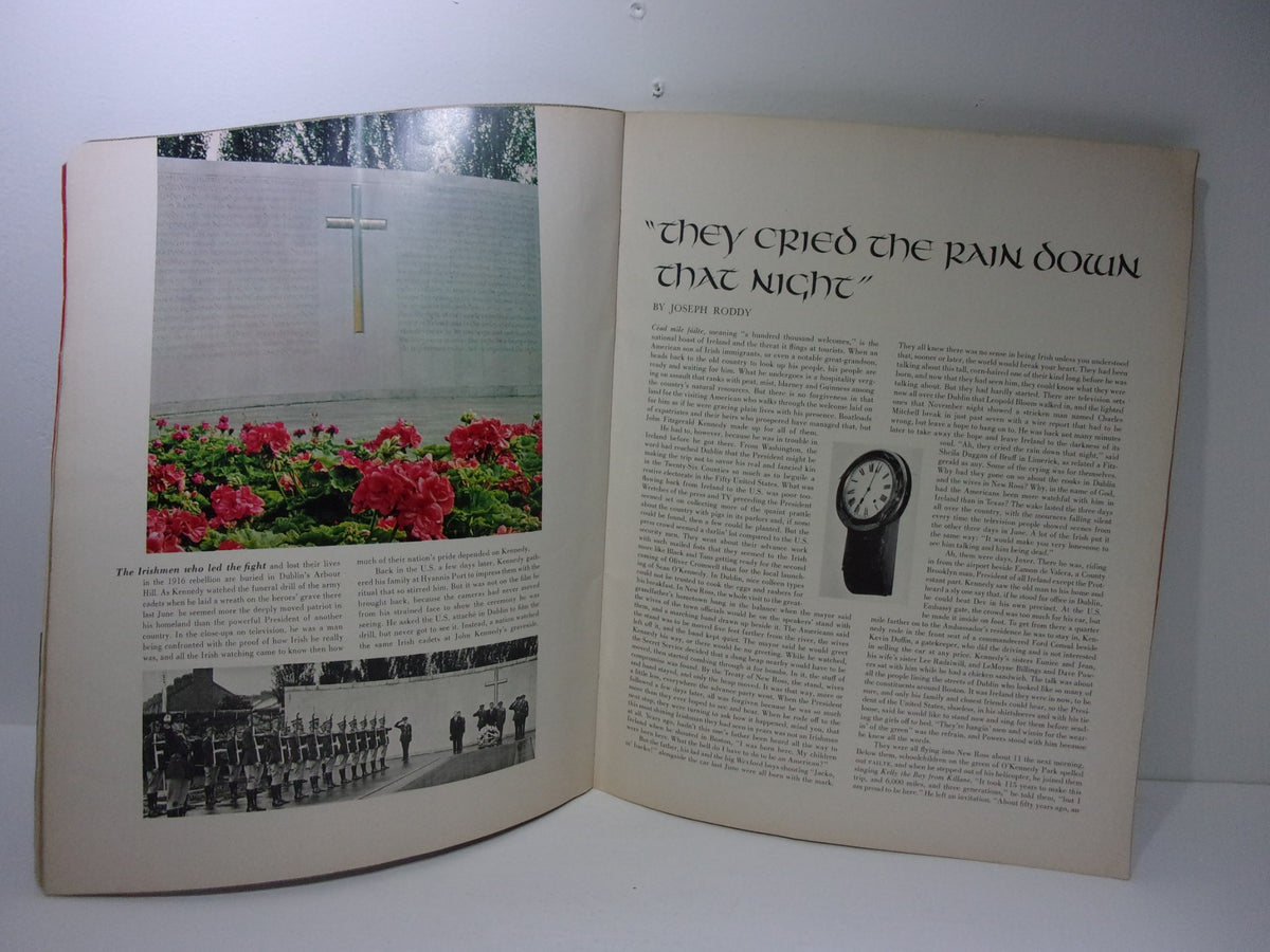 Page from the 1964 Look Magazine: JFK Memorial Book featuring a memorial cross, flowers, and text about JFK's legacy.
