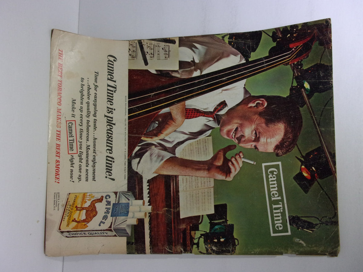 Advertisement page from Look Magazine: The JFK Memorial Issue promoting Camel cigarettes with a musician.
