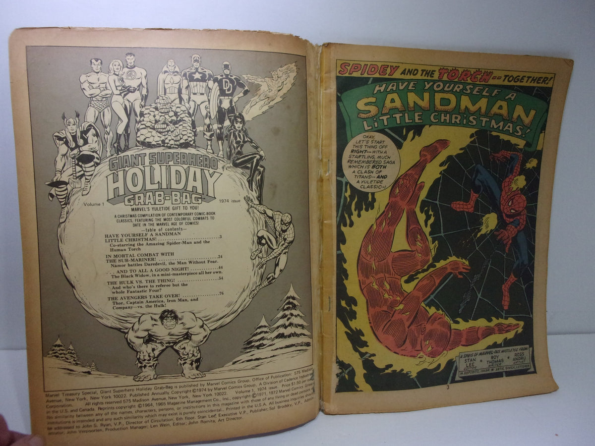 Inside pages of the 1974 Marvel Treasury Special Giant Superhero Holiday Grab-Bag showcasing the table of contents and artwork featuring Spider-Man and Human Torch, highlighting classic Christmas-themed adventures.