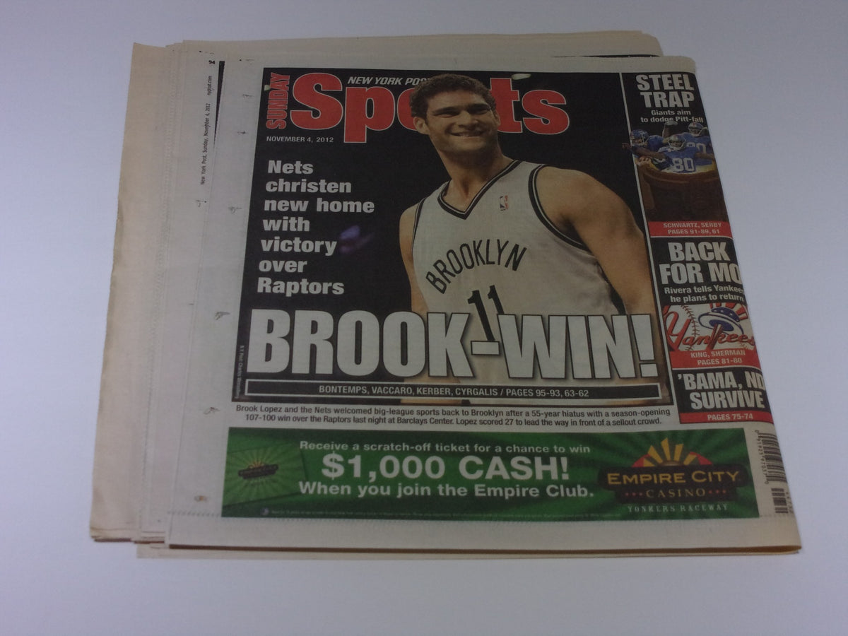 New York Post sports section from November 4, 2012, featuring a headline 'BROOK-WIN' about the Brooklyn Nets' victory, related to the newspaper coverage in the context of local events.