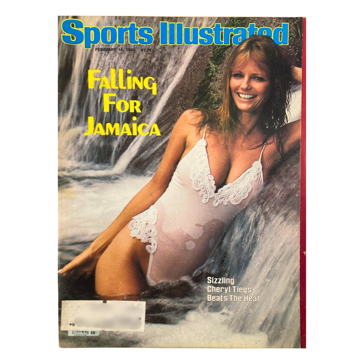 1983 Sports Illustrated magazine cover with Cheryl Tiegs, titled 'Falling For Jamaica,' highlighting her in a sheer swimsuit amidst a waterfall.