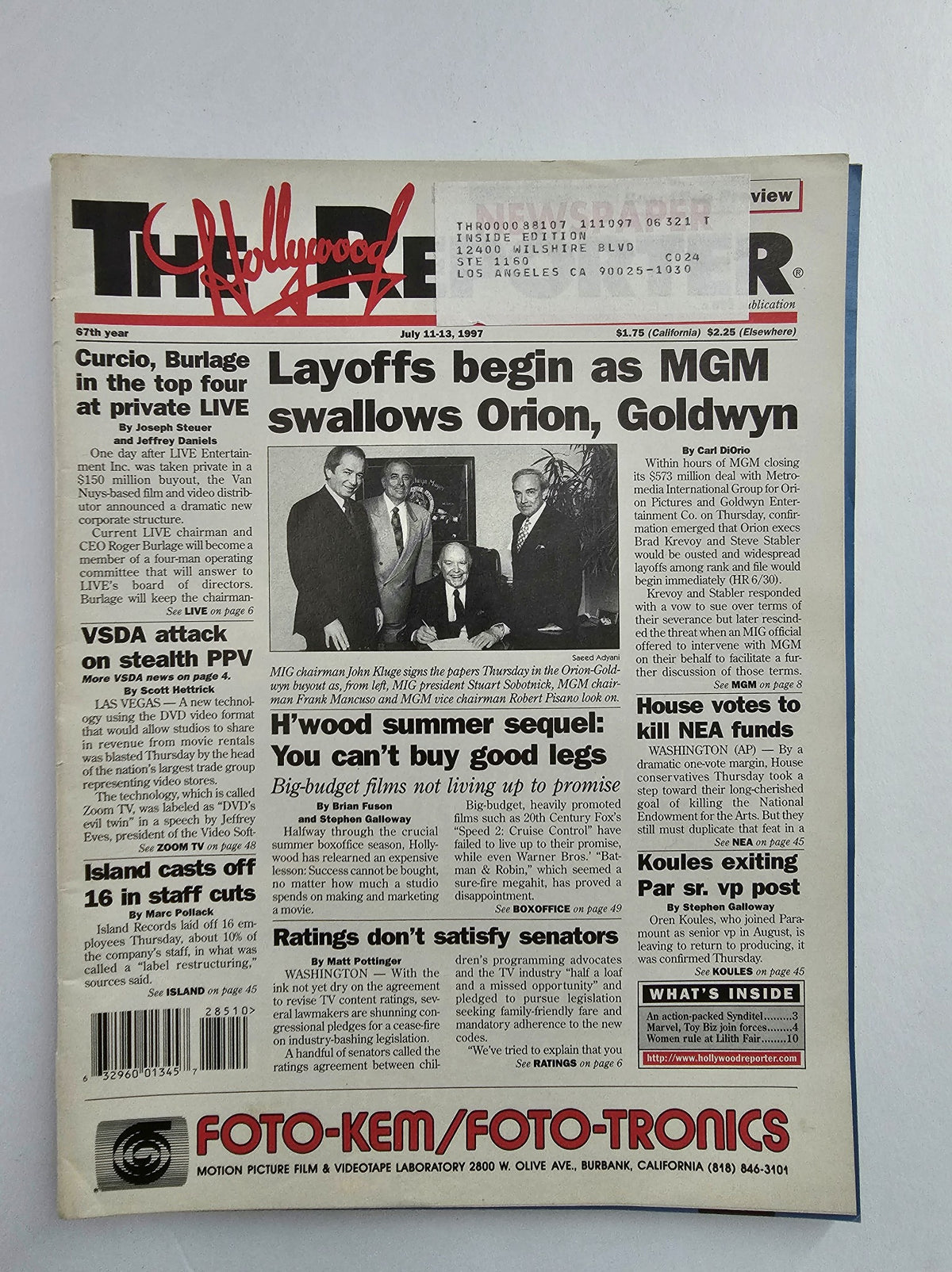 The Hollywood Reporter magazine issue dated July 11, 1997, featuring an article about layoffs at MGM and photos of key media figures, including John Kluge and Stuart Sobotnick. This collectible magazine captures insights into the entertainment industry during the late 1990s.