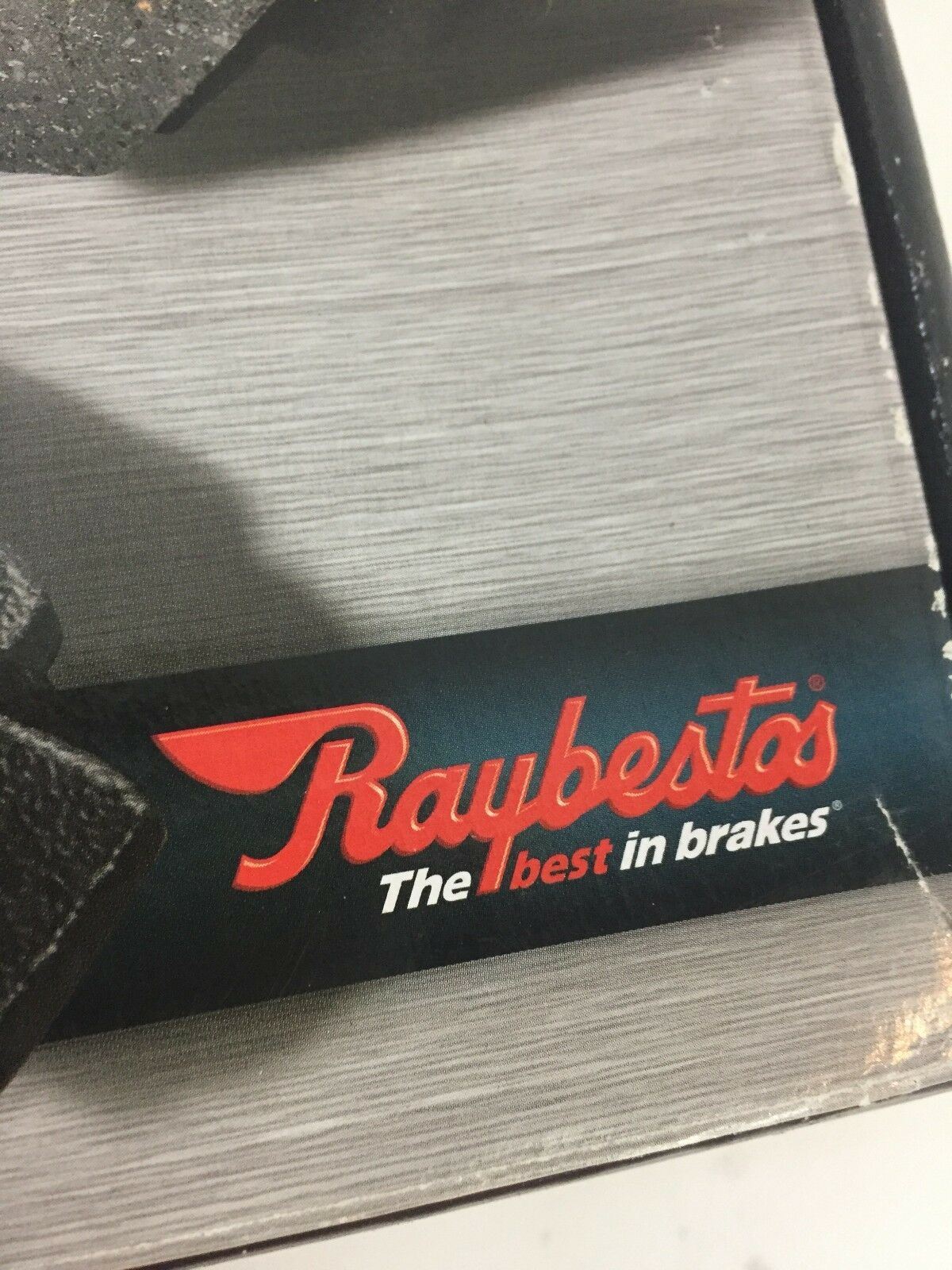 Raybestos logo on the packaging of EHT1340H Enhanced Technology Friction Pads Brake Pad Set, emphasizing its reputation as 'The best in brakes'.