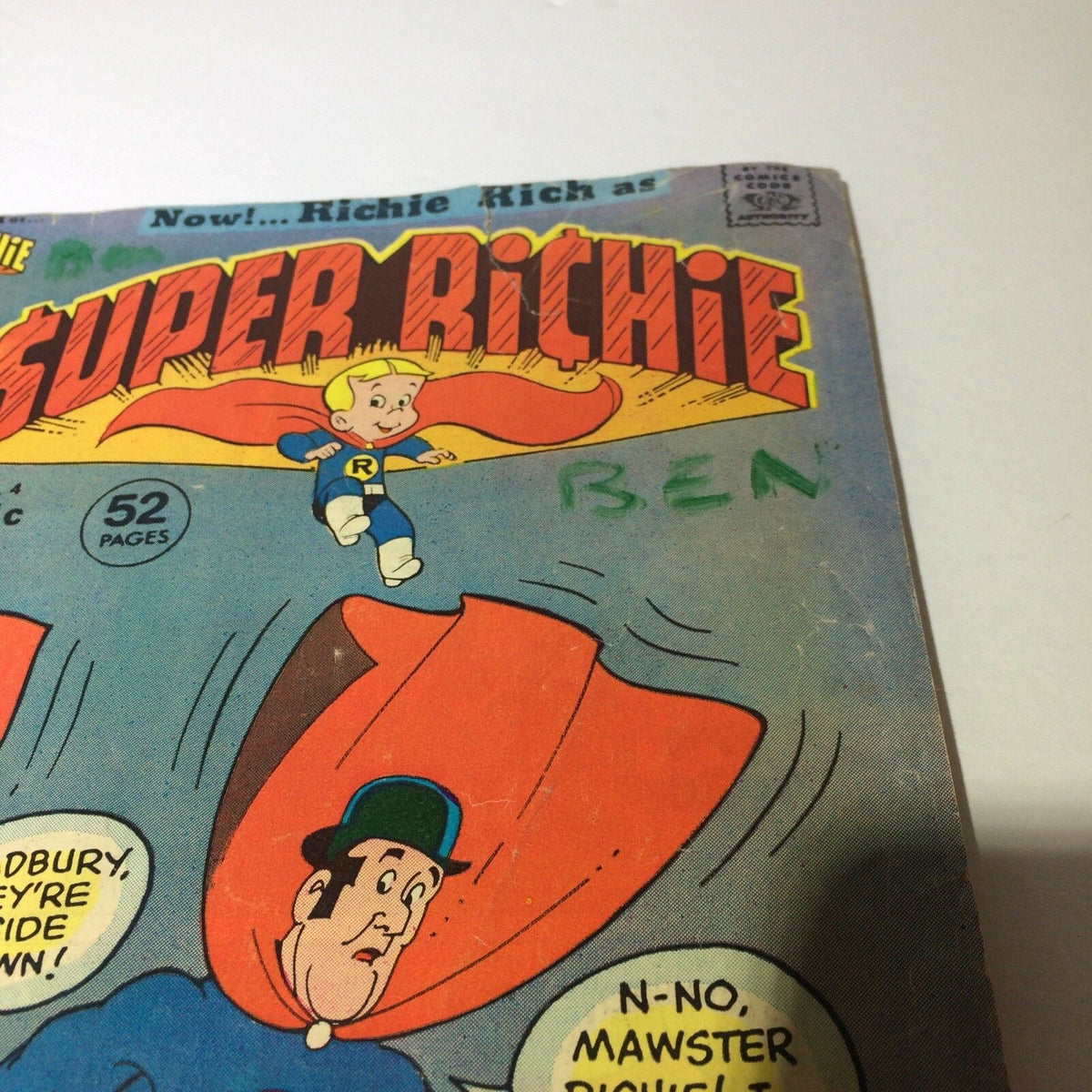 Super Richie #4 Collectible Vintage Comic Harvey World 'Peculiar Vandalism' featuring a close-up of the front cover showing minor damage and the written name 'Ben'.