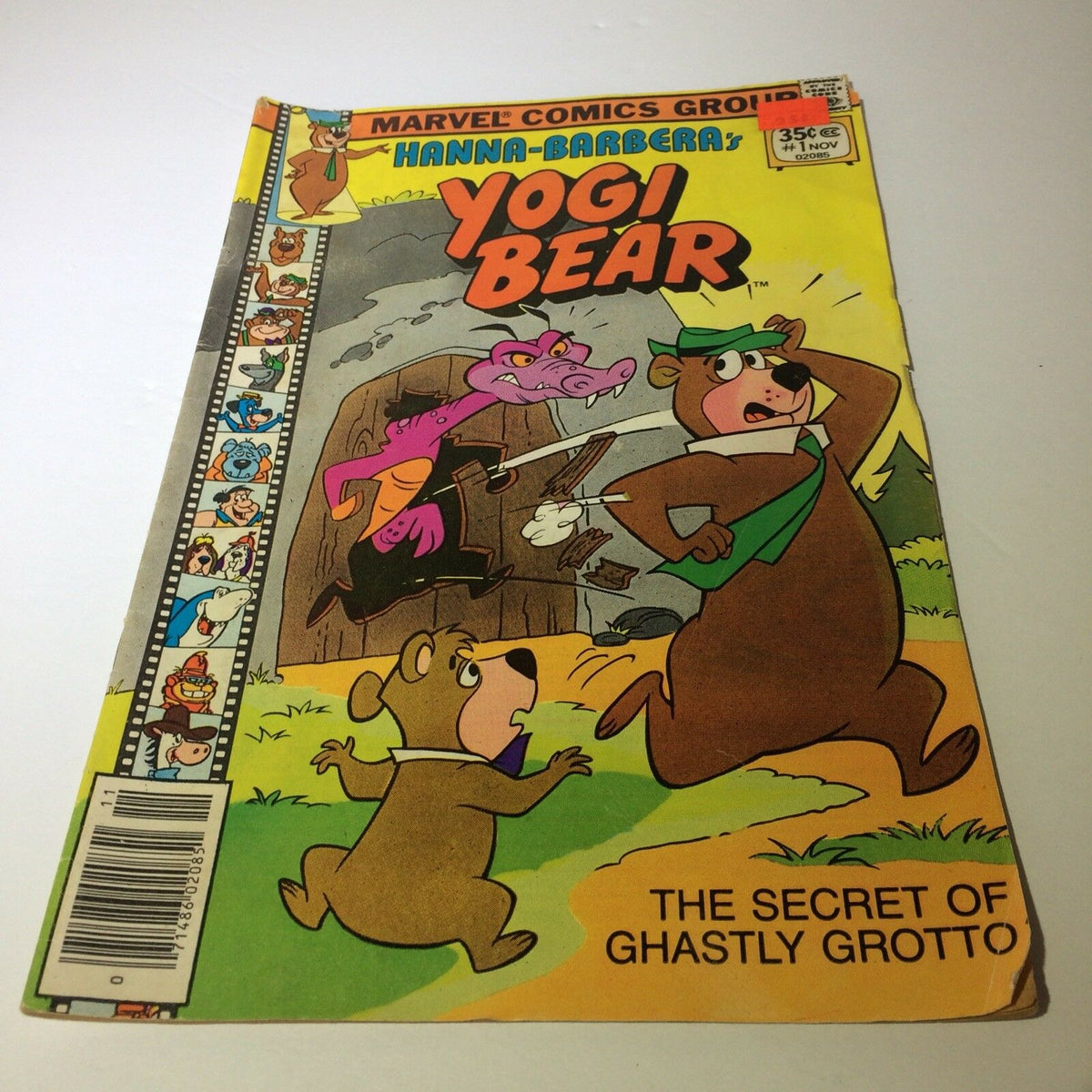 Cover of Marvel Comics YOGI BEAR #1 from November 1977 featuring Yogi Bear in action with other characters, depicting the story 'The Secret of Ghastly Grotto'.