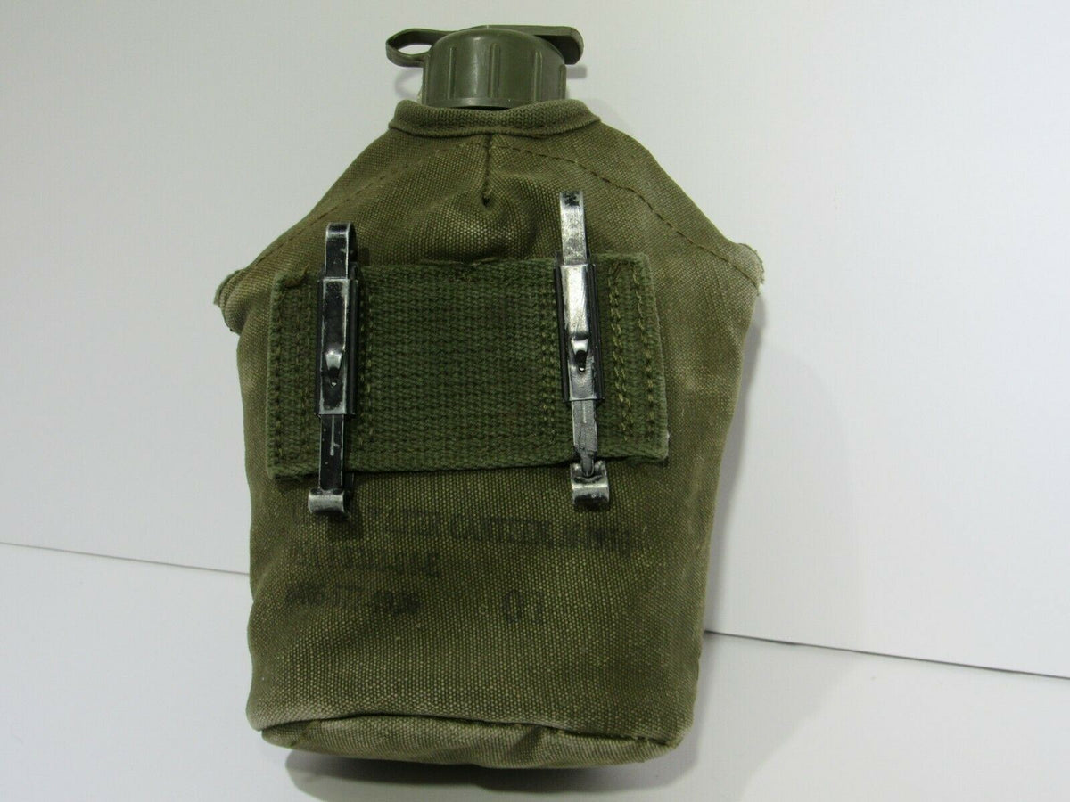 US Military Issue Vietnam Style War Era Canteen with Nylon Cover - back view displaying the canteen's functionality and detailing.