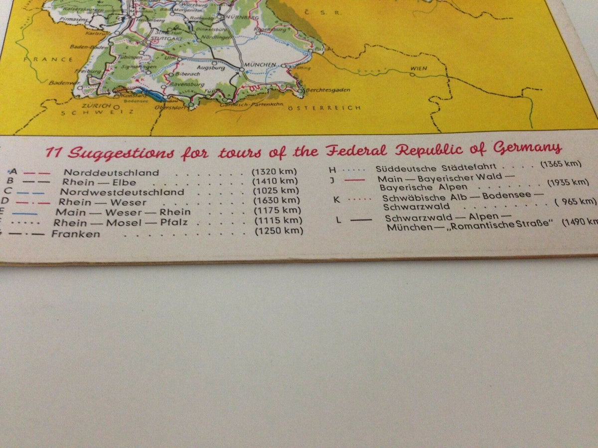Close-up of the maps in the Vintage 1950s guide booklet to motoring in Germany, showcasing suggested routes and distances for road trips.