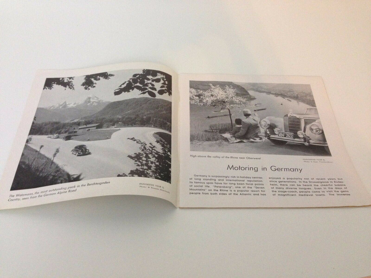 Inside page of the Vintage 1950s guide booklet to motoring in Germany, illustrating scenic landscapes and classic automobiles, highlighting the charm of historical road travel.