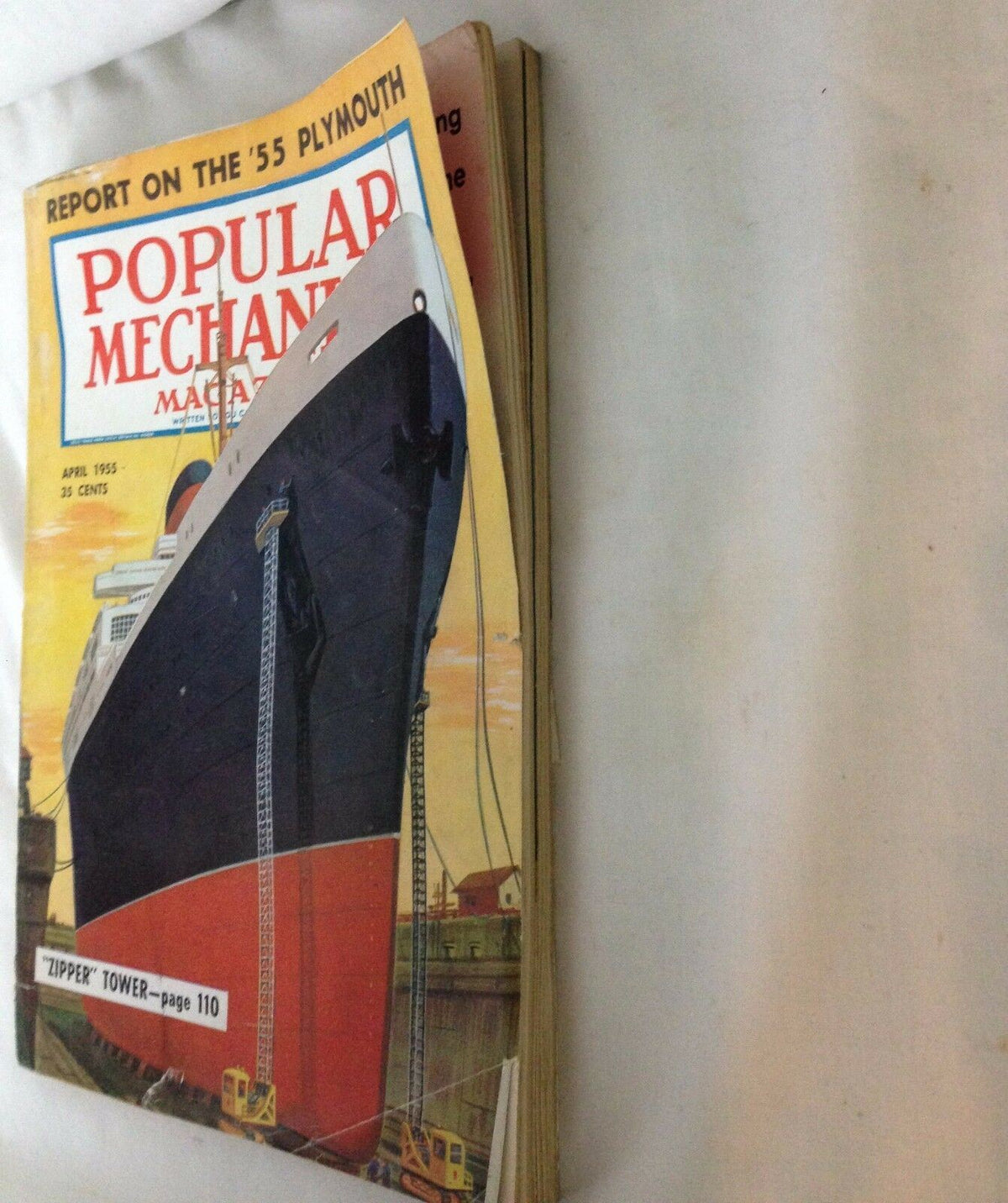 POPULAR MECHANICS-VINTAGE-OCTOBER,1955 - Report on the '55 Plymouth