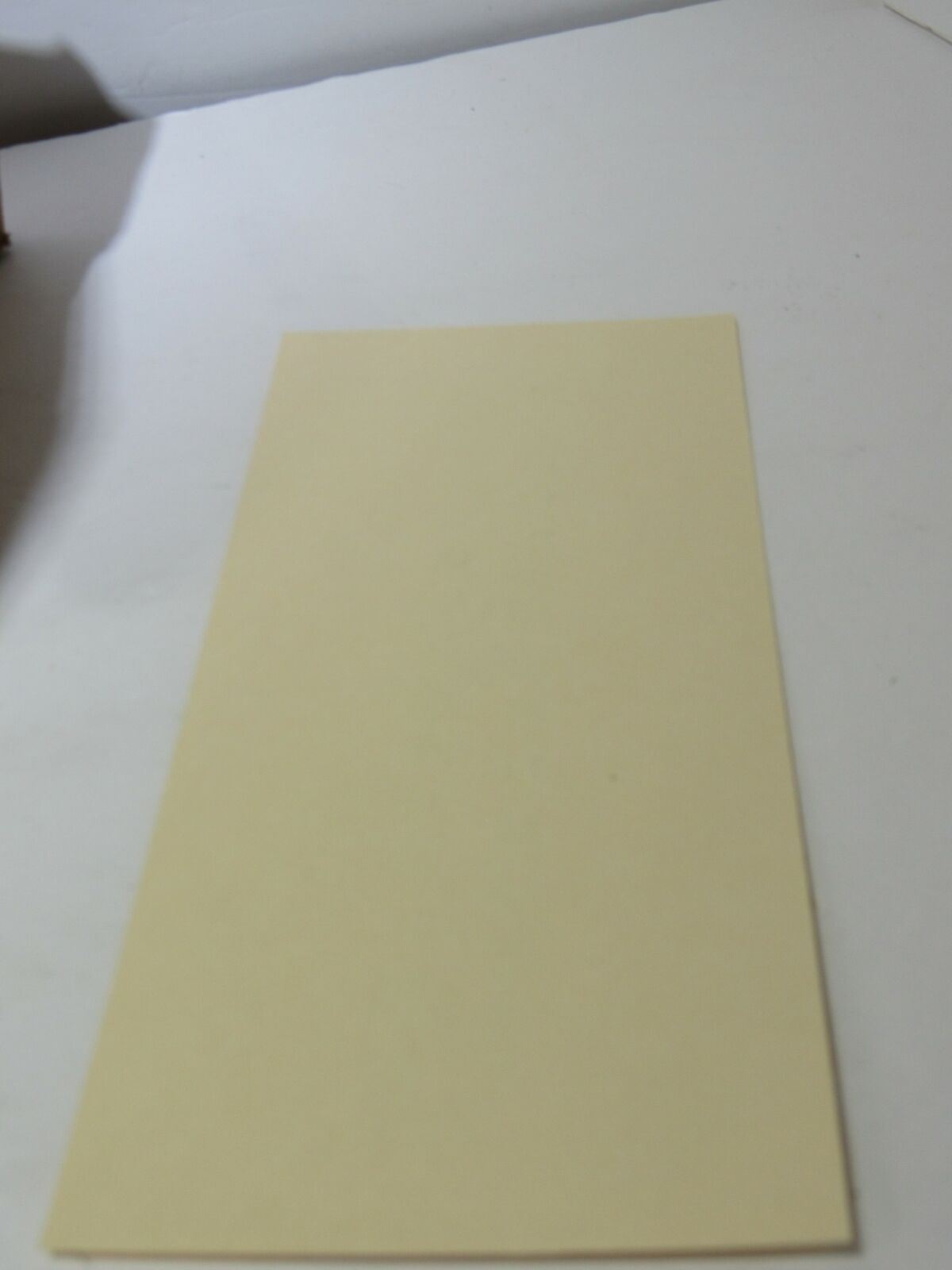 ULINE Bi-Weekly Time Cards 1000 Pcs S-8453 NEW, flat yellow blank time card on a white surface.
