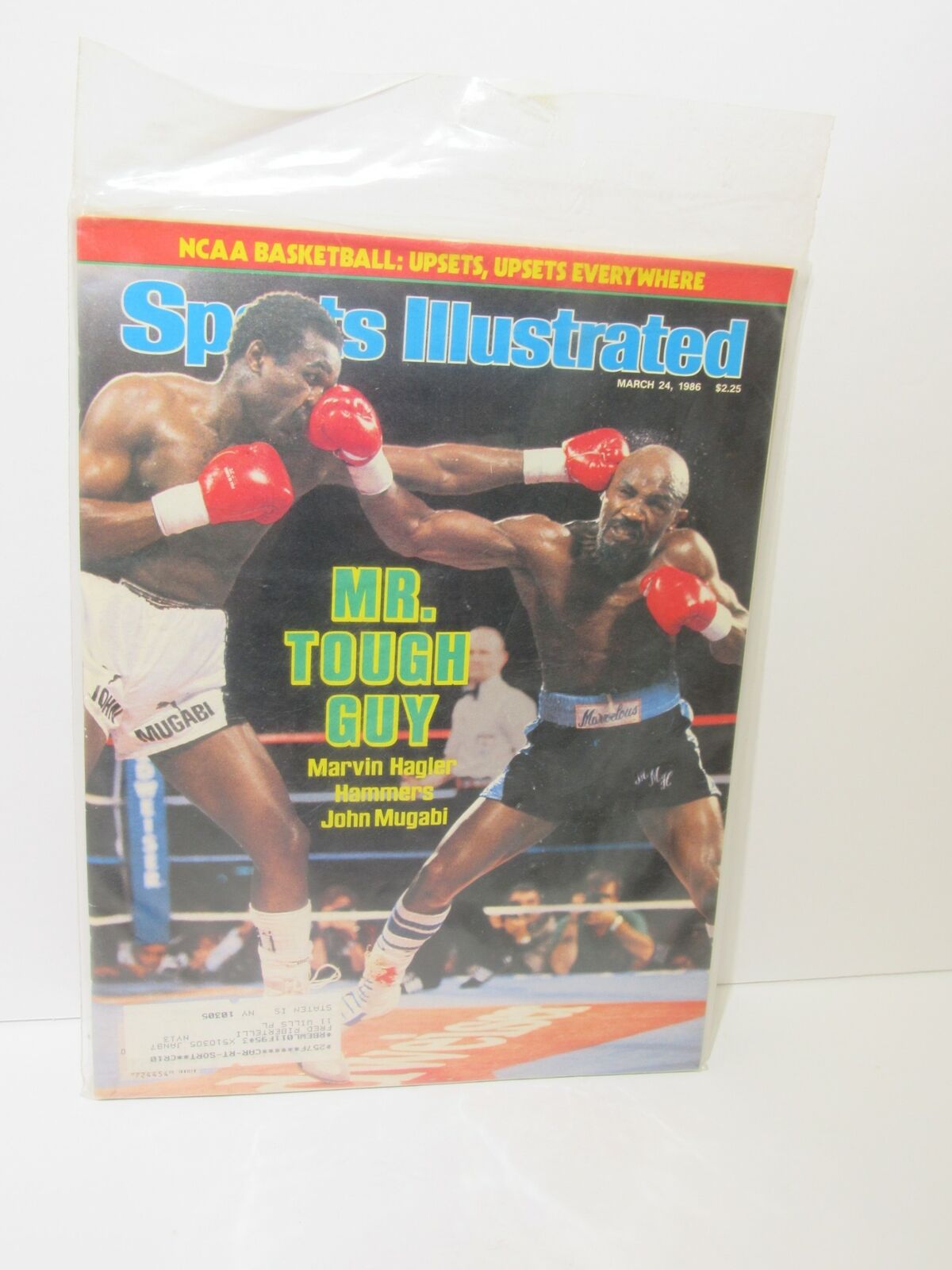 Sports Illustrated March 24 1986 cover featuring Marvin Hagler vs John Mugabi, showcasing the boxing match with both fighters in action.