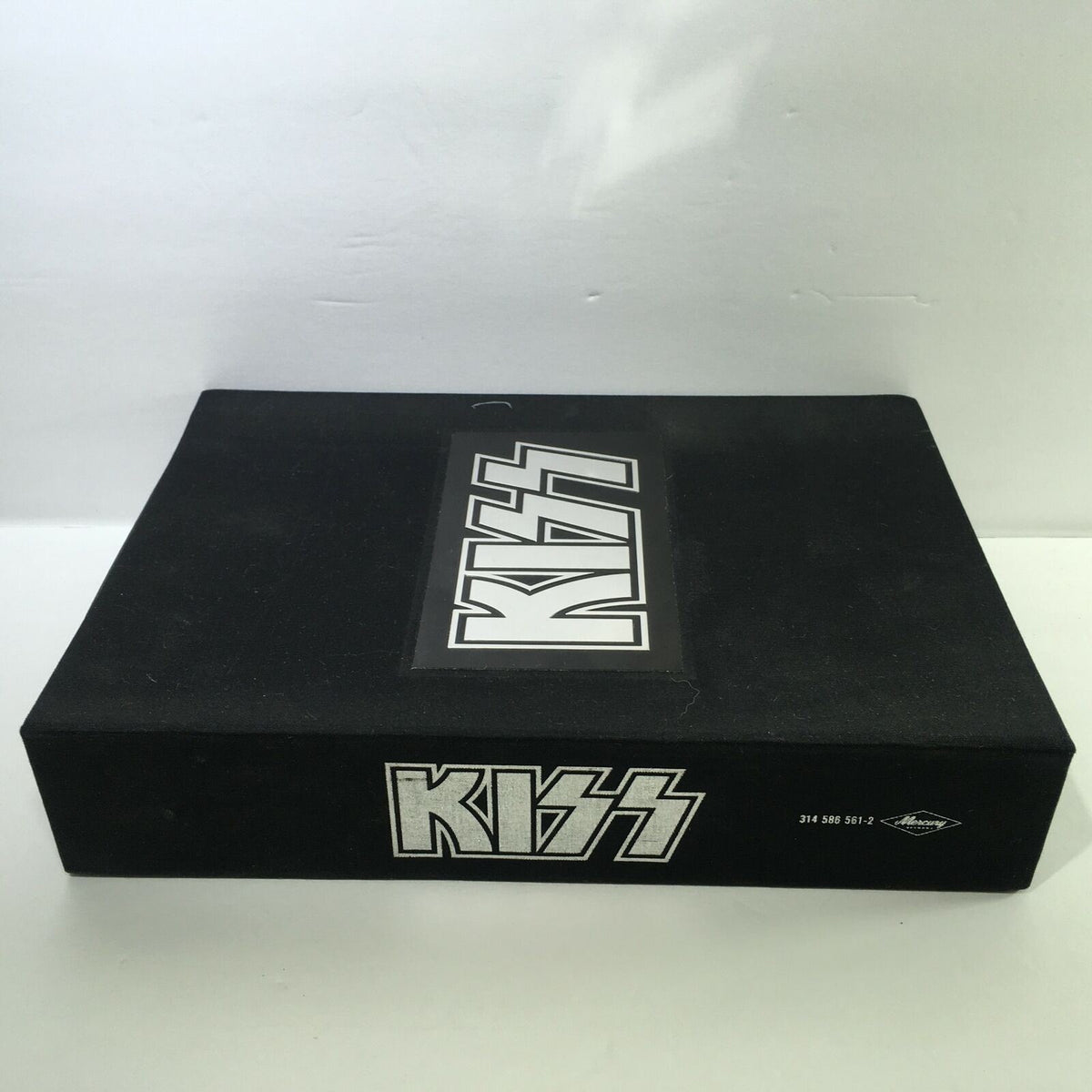 Front view of the Definitive Kiss Collection 5 Disc Box Set featuring the iconic KISS logo and product packaging.