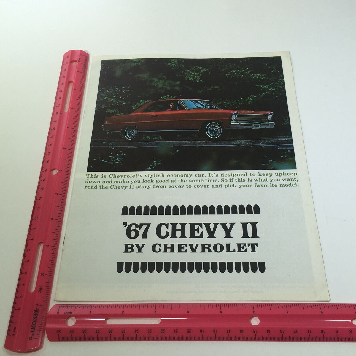 Cover of '67 Chevy II by Chevrolet, featuring a stylish economy car design. Illustrated from the 1967 Chevelle by Chevrolet SS 396 catalog, highlighting the Chevrolet brand's history and models.