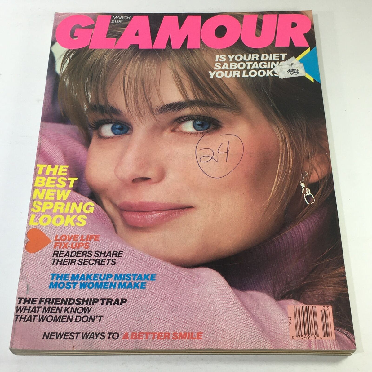 Cover of VTG Glamour Magazine: March 1987 featuring Paulina Porizkova, showcasing vibrant fashion headlines and her striking close-up.