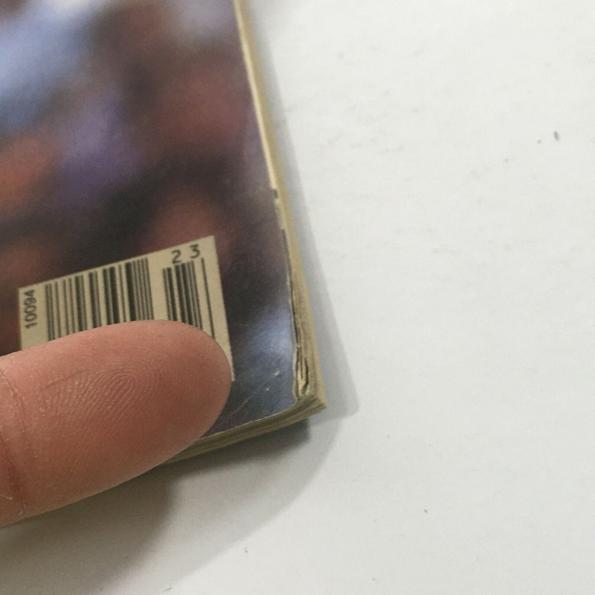 Close-up of the spine and barcode of Sports Illustrated: June 10 1985 - NBA Kareem Abdul-Jabbar magazine, showcasing its vintage condition.