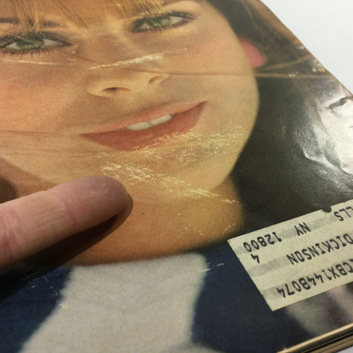 Cover of VTG Mademoiselle Magazine: April 1967 - College Beauty Fashion Issue, featuring a woman's face with a smile and visible cosmetic details, depicting vintage beauty trends.