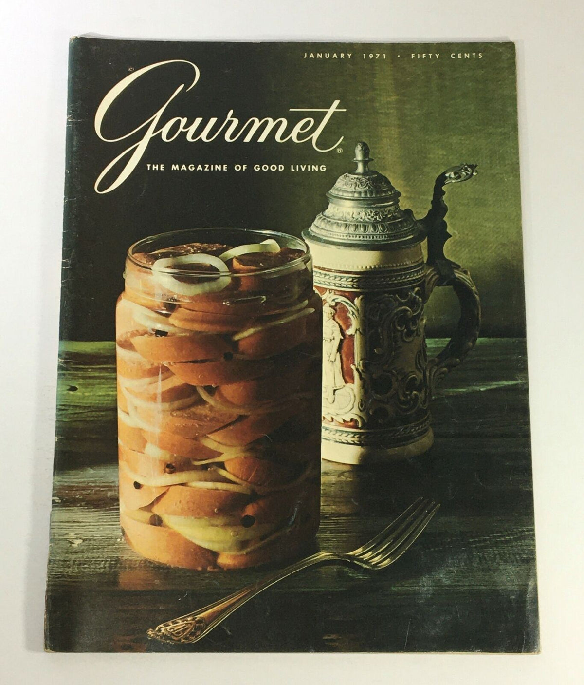 Cover of VTG Gourmet The Magazine of Good Living January 1971 issue featuring a glass jar with layered vegetables and an ornate stein, highlighting the culinary exploration of the 1970s.