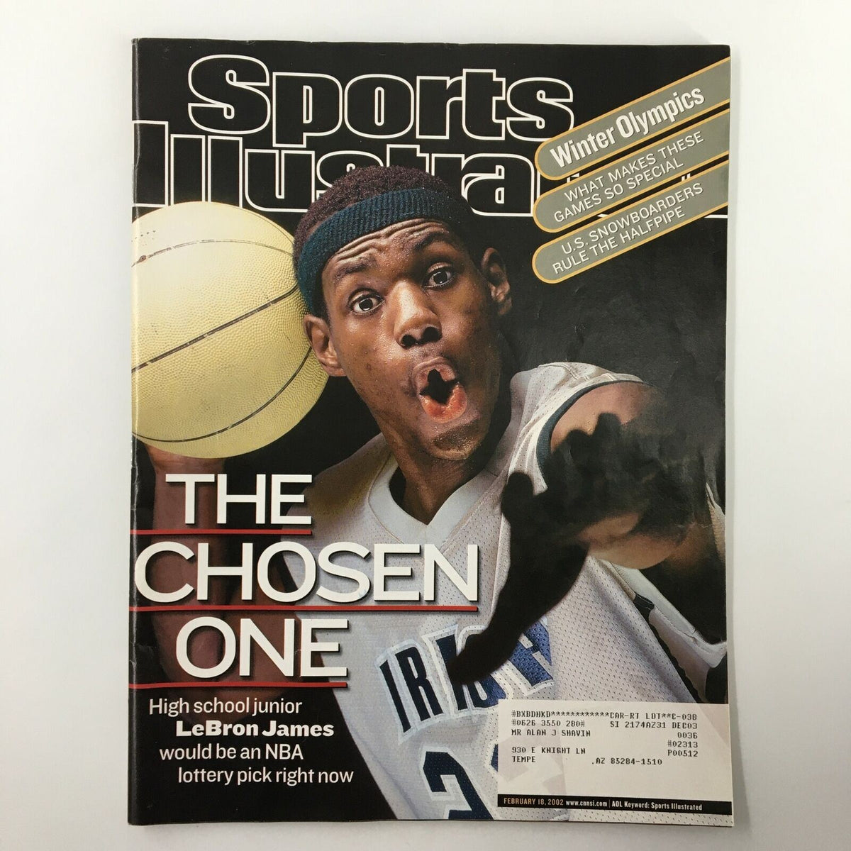 Sports Illustrated Magazine February 18, 2002 cover featuring LeBron James as 'The Chosen One'. Highlights LeBron's early basketball career with an impactful image of him in action.