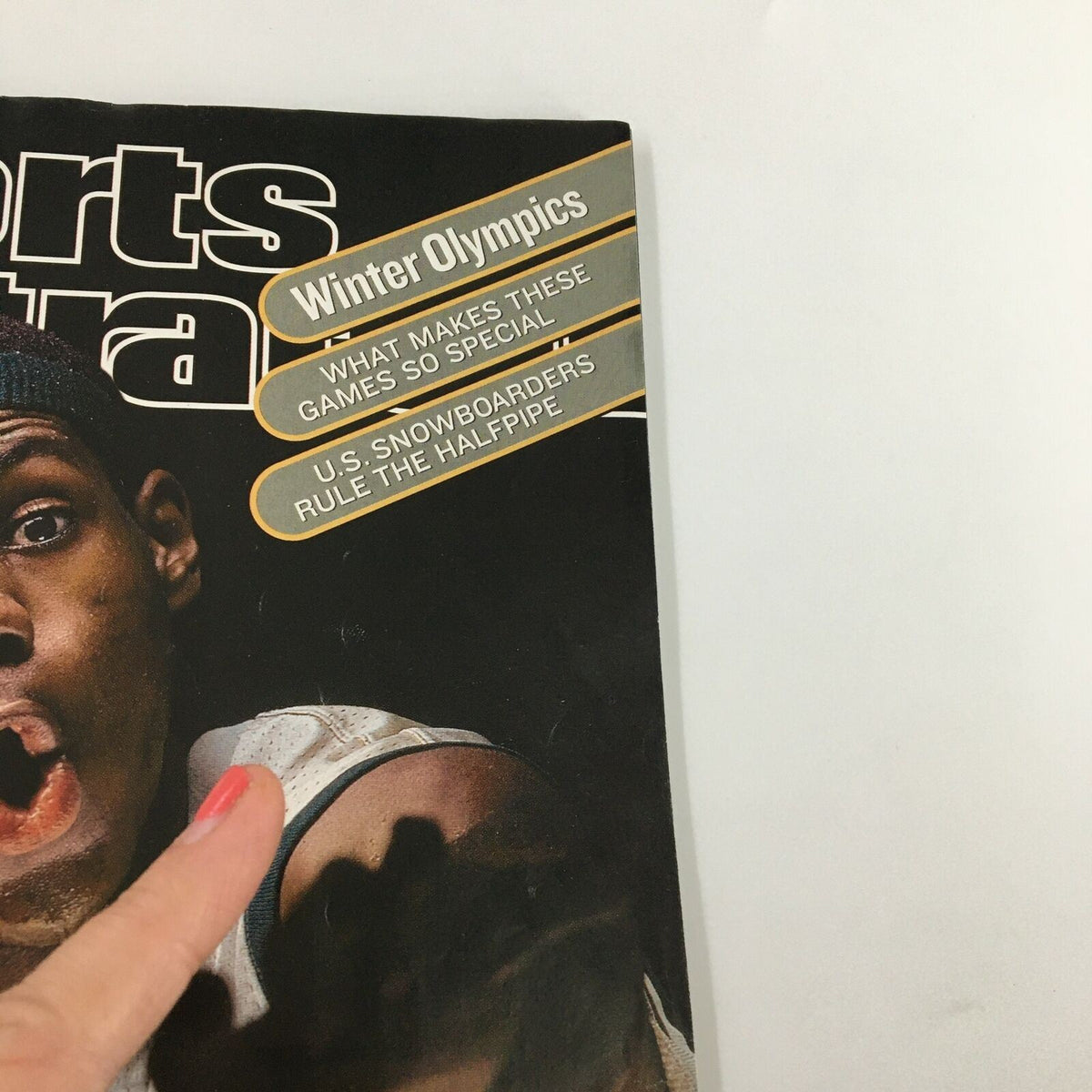 Close-up of the Sports Illustrated Magazine February 18, 2002 cover, emphasizing the Winter Olympics feature and LeBron James's story as 'The Chosen One'.