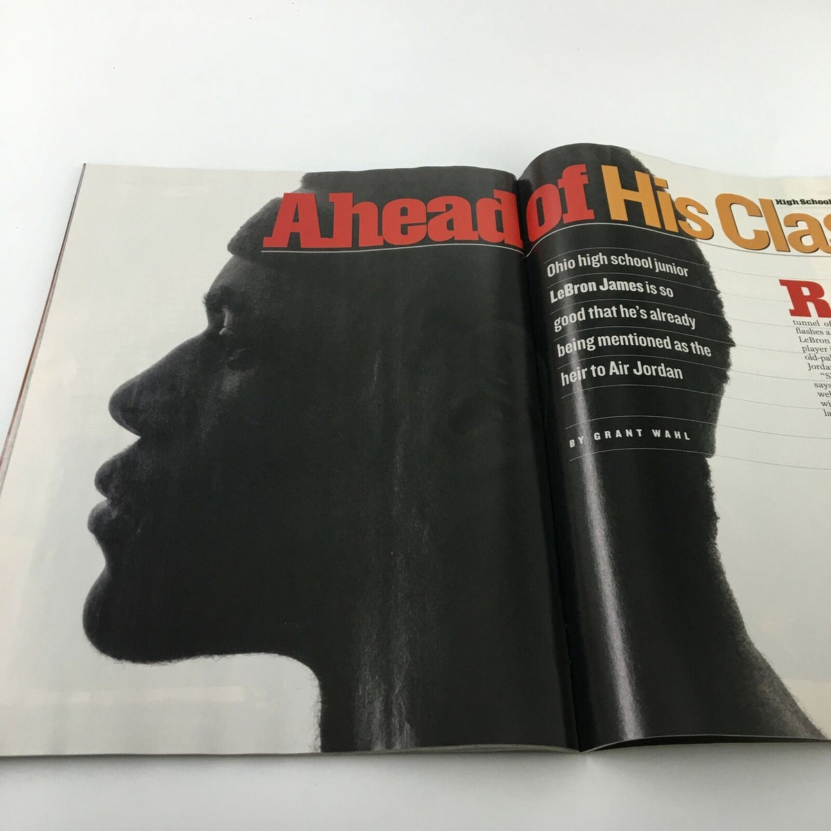 Feature article within Sports Illustrated Magazine February 18, 2002, depicting LeBron James's profile with the text 'Ahead of His Class', highlighting his early talent and comparisons to Air Jordan.