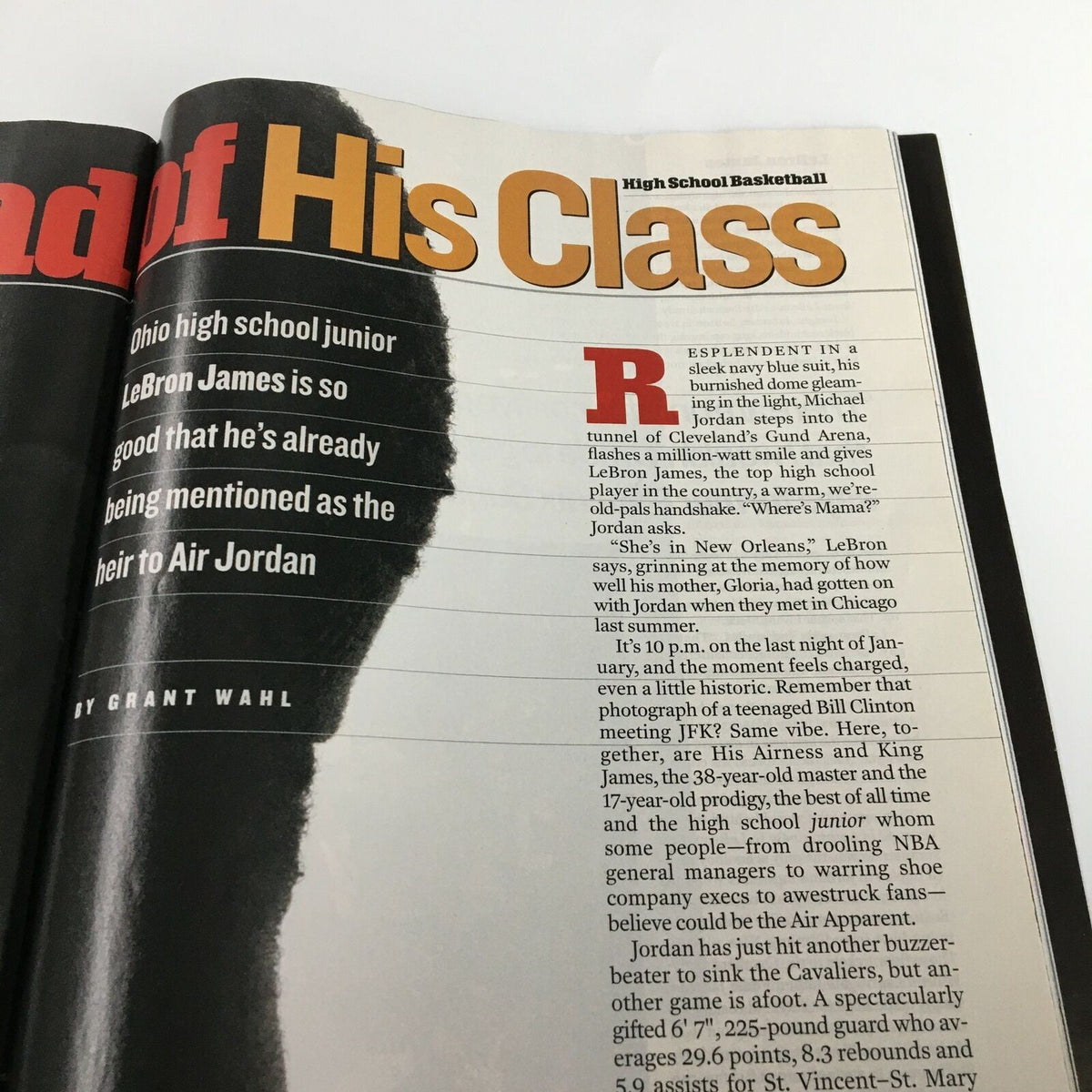An excerpt from Sports Illustrated Magazine February 18, 2002, featuring LeBron James as a high school junior, discussing his elite skills and potential to be the heir to Air Jordan.