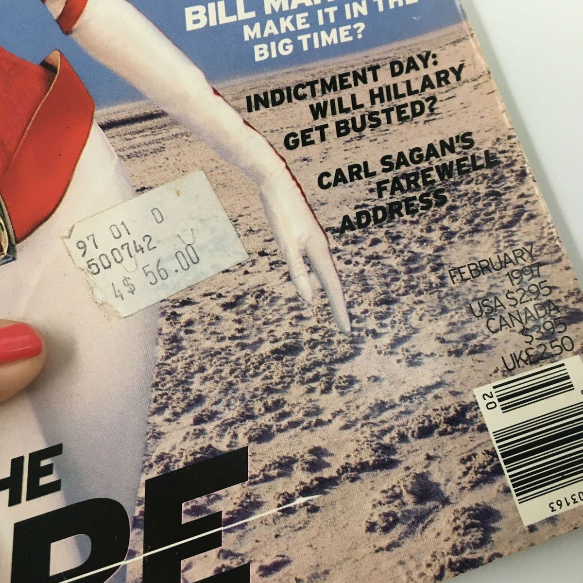 Back cover of George Magazine February 1997 displaying a price sticker and key articles including a feature on Hillary Clinton and Carl Sagan's farewell address, showcasing the magazine's diverse content.