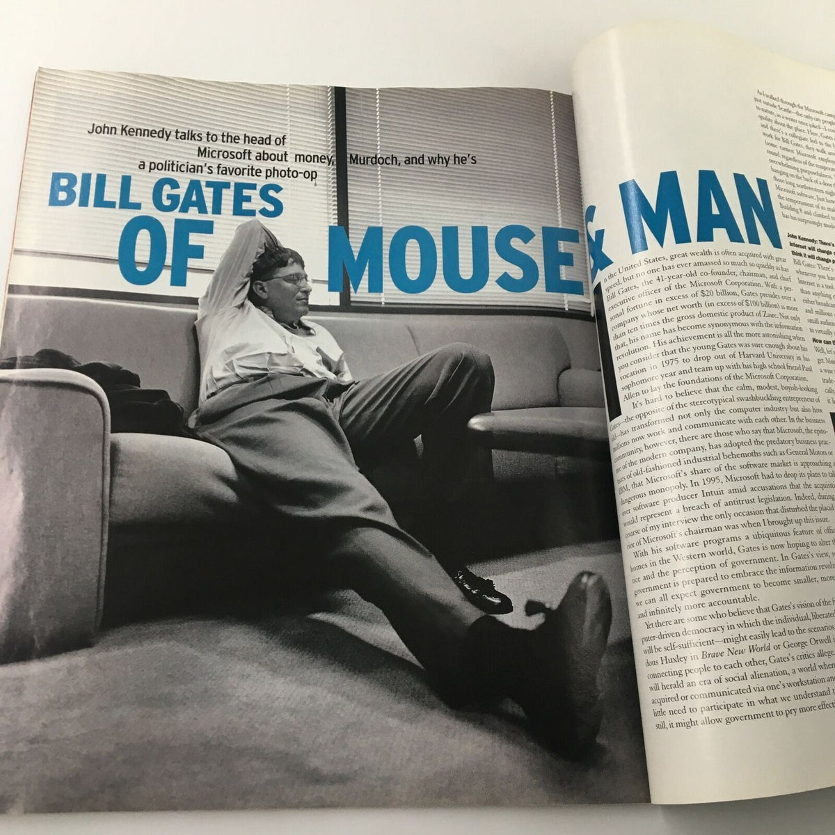 Image from George Magazine February 1997 featuring Bill Gates lounging on a couch, illustrating the intersection of technology and culture for a thought-provoking article.