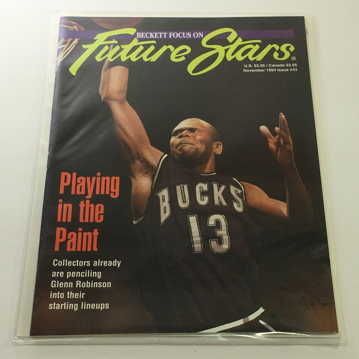 Beckett Future Stars: November 1994 Issue #43 featuring Bucks player Glenn Robinson, showcasing the theme 'Playing in the Paint' in excellent condition, bagged and boarded.