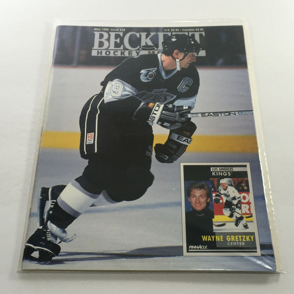 Beckett Hockey Monthly May 1992 featuring Wayne Gretzky of the Los Angeles Kings on the cover, showcasing the iconic hockey player in action.