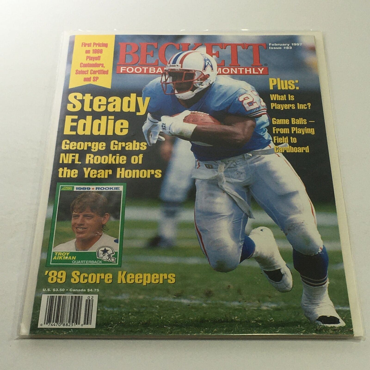 Beckett Football Card Monthly: February 1997 Issue #83 featuring Eddie George on the cover, showcasing his NFL Rookie highlights and achievements.