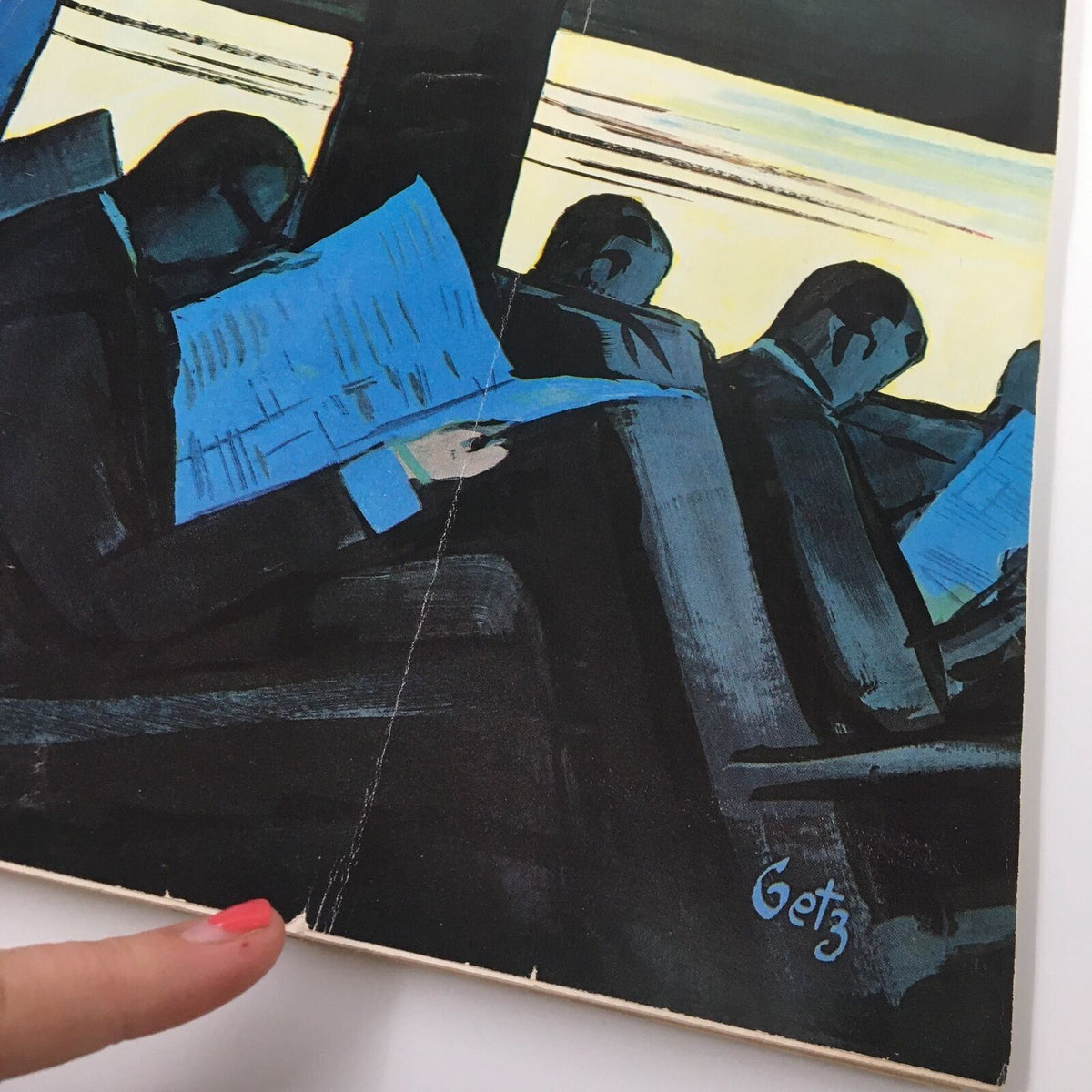 Close-up of the cover of The New Yorker Full Magazine November 4 1961 by Arthur Getz, highlighting an illustration of passengers reading with visible crease marks.