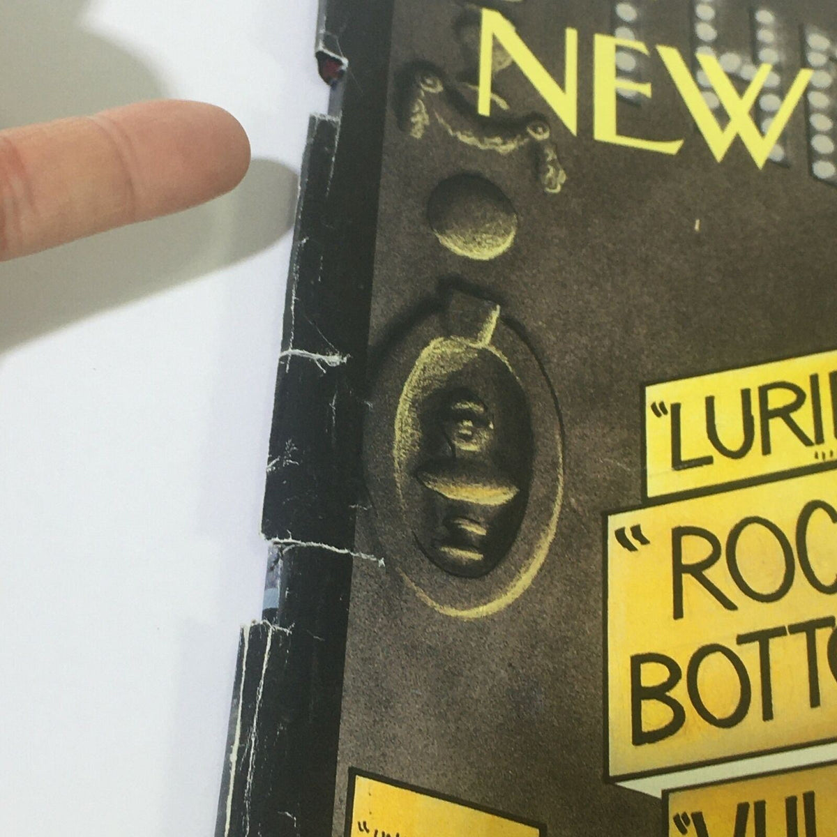 Detail image of The New Yorker March 5 2001 cover by Ian Falconer showing the magazine's spine and a decorative doorknob illustration.