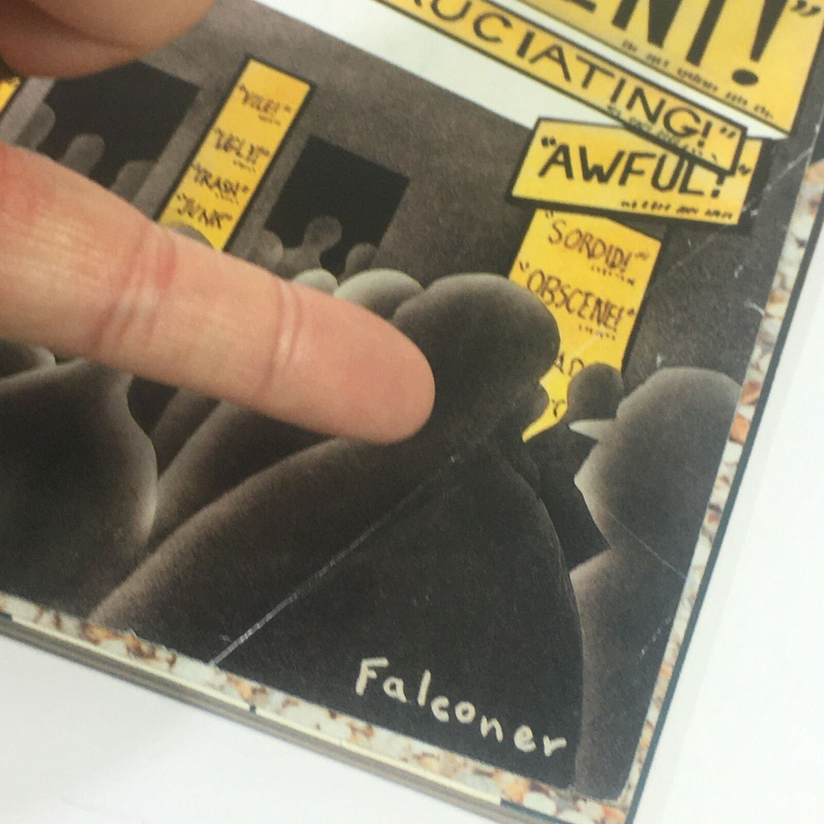 Close-up image of The New Yorker March 5 2001 cover by Ian Falconer highlighting the artist's signature amid protest signs on the cover.