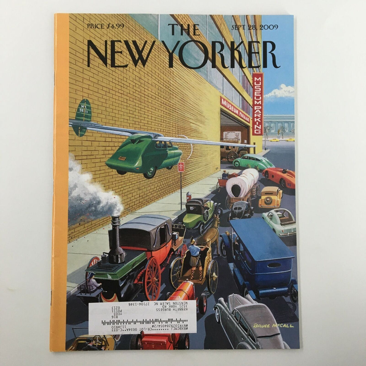 The New Yorker Full Magazine September 28 2009 featuring the cover illustration 'Museum Parking' by Bruce McCall, showcasing vintage vehicles against a city backdrop.