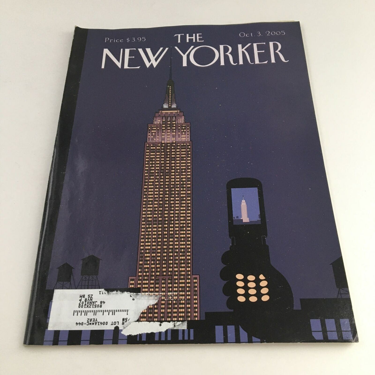 The New Yorker Full Magazine October 3 2005 featuring a cover illustration of the Empire State Building at night by Chris Ware. This vintage magazine captures early 2000s culture and artistic expression.