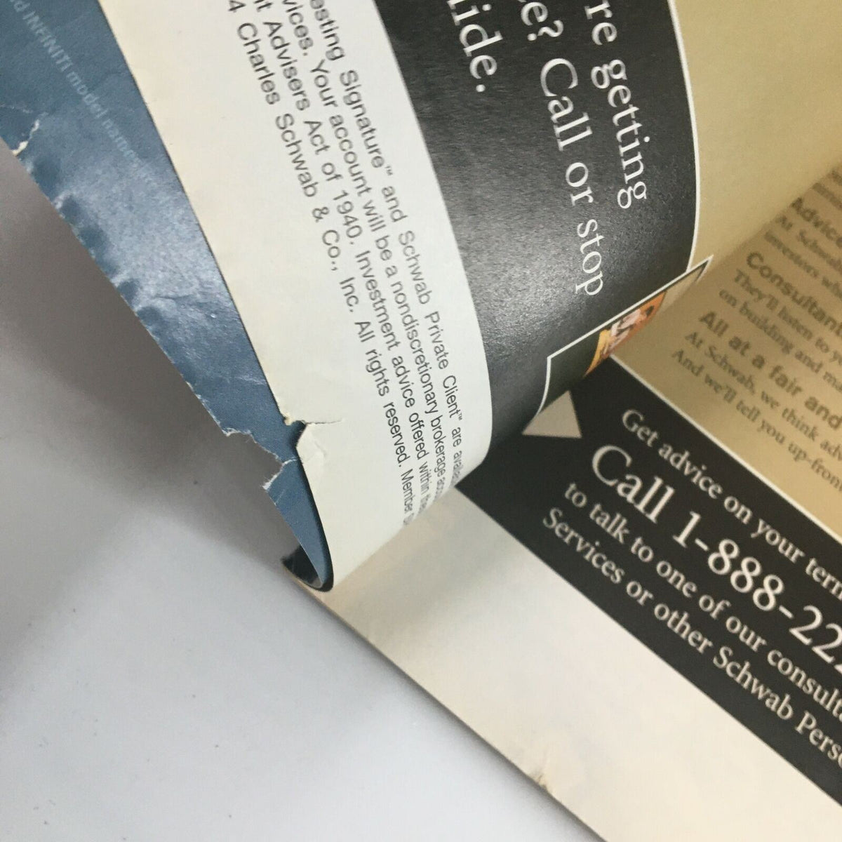 Image capturing the edge of a page from The New Yorker magazine May 10, 2004, displaying minor wear, showing the vintage character of this edition with the cover art 'Open Wound' by Ana Juan.