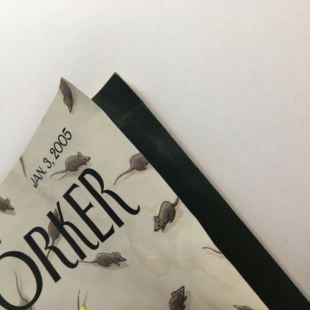 Side view of The New Yorker Magazine January 3 2005 displaying the spine and part of the cover, highlighting the magazine's vintage details.