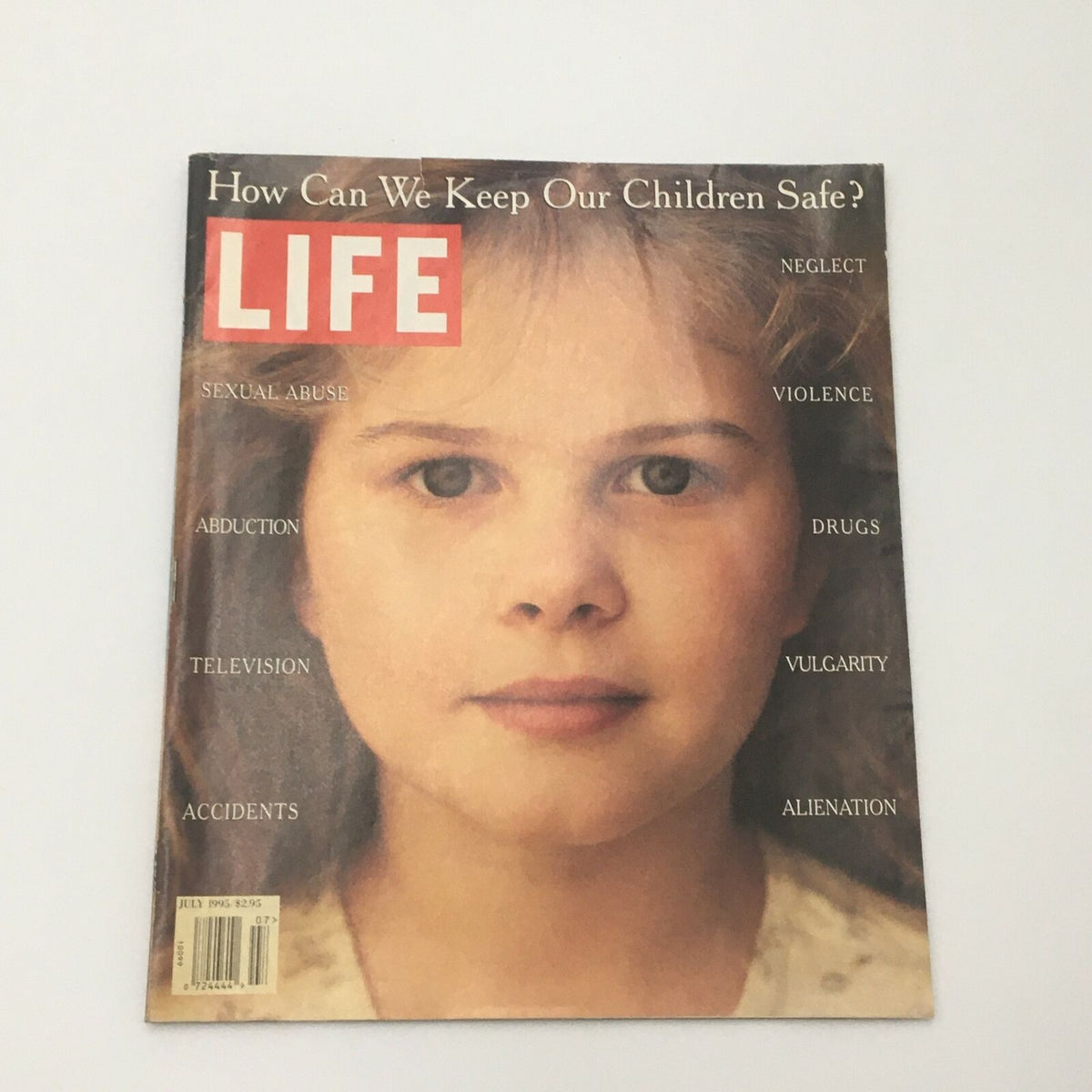 Cover of Life Magazine from July 1995 titled 'How Can We Keep Our Children Safe?' featuring a young girl, addressing issues such as sexual abuse, abduction, neglect, and violence.