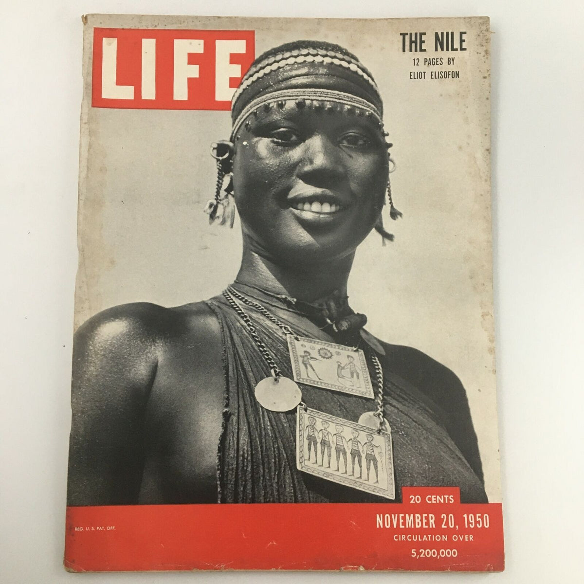 Cover of VTG Life Magazine November 20, 1950, featuring a striking photograph of a smiling woman, showcasing intricate jewelry, with the title 'The Nile' by Eliot Elisofon.
