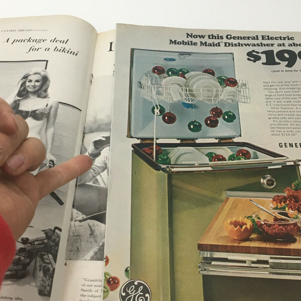 Interior page of the VTG Life Magazine from December 9, 1966 showing a vintage advertisement for the General Electric Mobile Maid Dishwasher. The ad highlights the appliance with festive decorations and features nostalgic references to the 1960s.