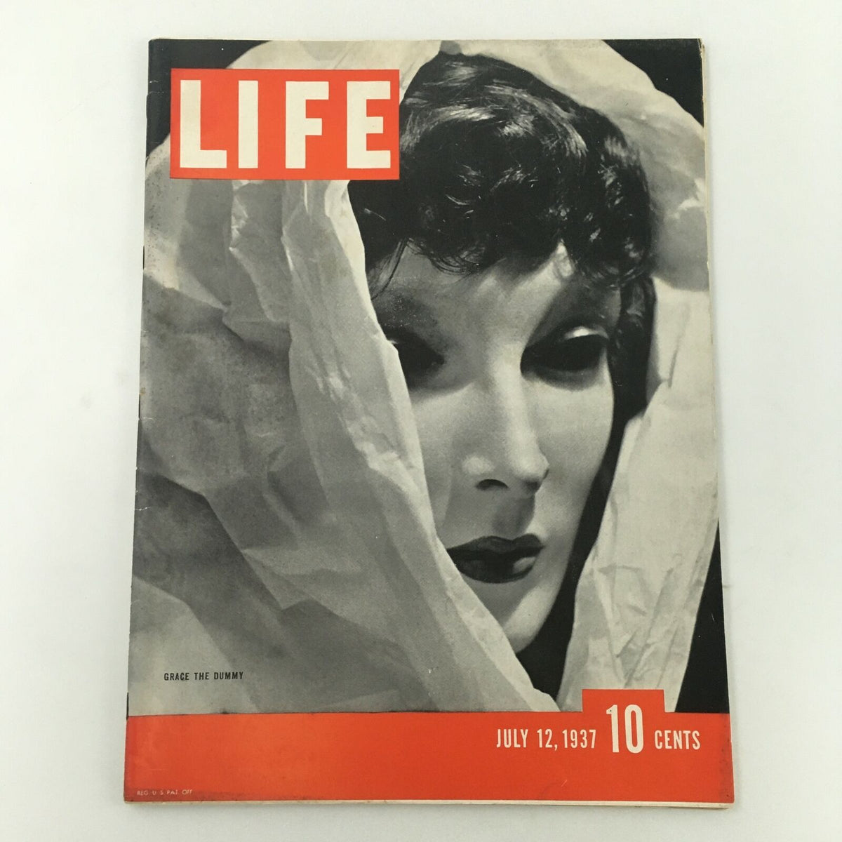 VTG 0 Photograph of Grace the Dummy, Newsstand, featuring the cover of Life Magazine from July 12, 1937, showcasing a striking black and white image of Grace the Dummy, a vintage collectible in very good condition.