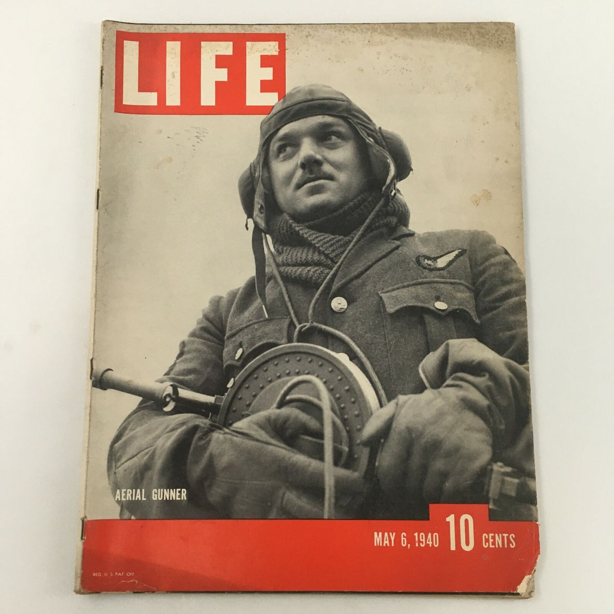 Vintage Life Magazine from May 6, 1940 featuring a striking photograph of an aerial gunner. The magazine displays its original newsstand format, showcasing historical significance and minor wear details.