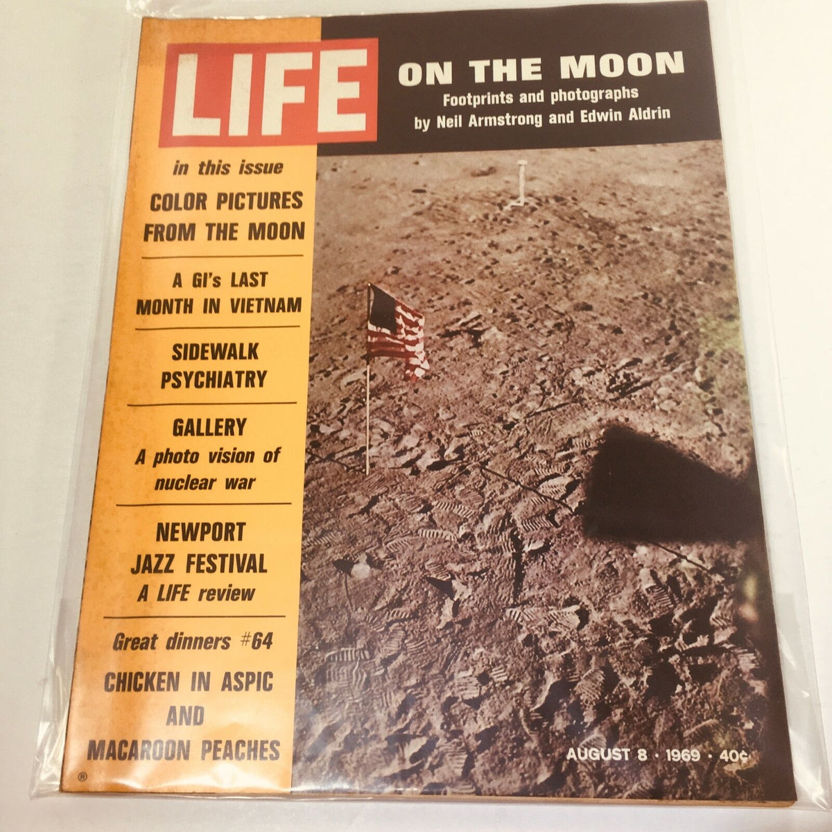 VTG Life Magazine from August 8, 1969, featuring the iconic footprints of Neil Armstrong and Edwin Aldrin on the moon, highlighting a pivotal moment in space exploration.