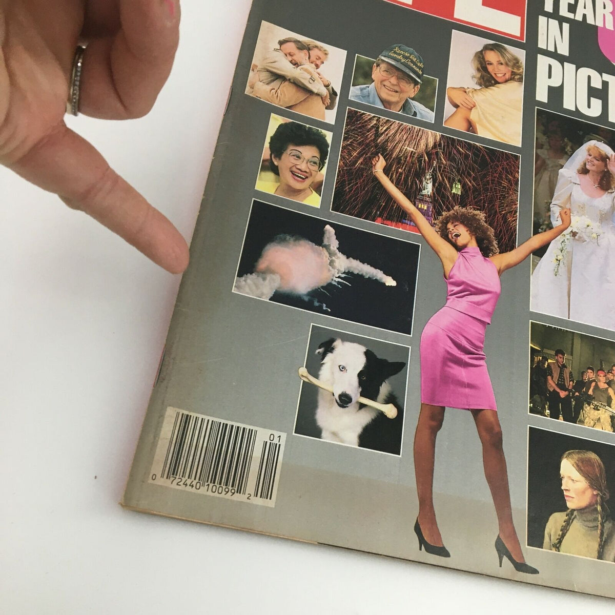 Close-up of the Life Magazine January 1987 cover depicting a woman in a pink dress and various significant moments from 1986, emphasizing its collector's value.