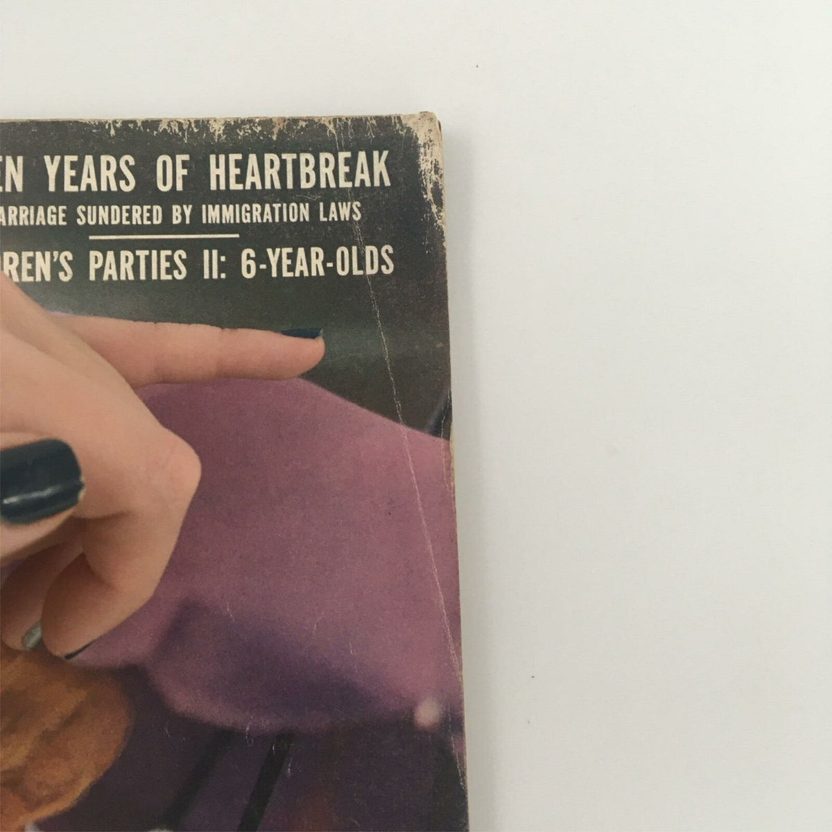 Close-up of the edge of the VTG Life Magazine from March 5, 1956 featuring Kim Novak, showing minor wear and text indicating articles within.