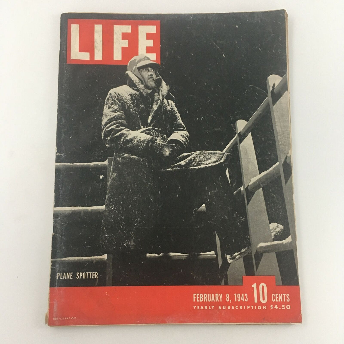 Vintage Life Magazine cover from February 8, 1943, featuring a Plane Spotter in a snowy scene, highlighting wartime America.