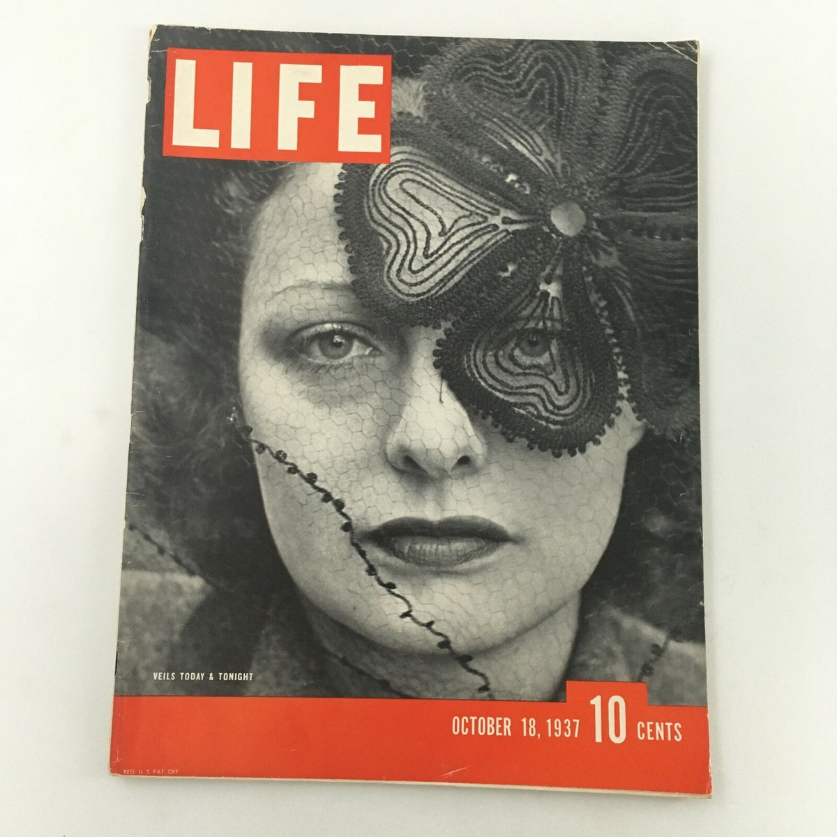 Cover of VTG Life Magazine from October 18, 1937 featuring the title 'Veils Today & Tonight'. The magazine displays an elegant black-and-white photograph with detailed lace veiling and a striking design, typical of late 1930s fashion.